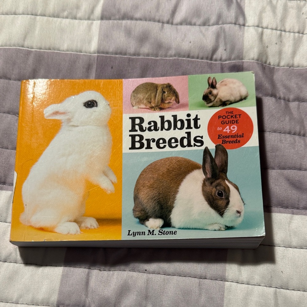 Rabbit Breeds Guide by Lynn M. Stone - Multicolor